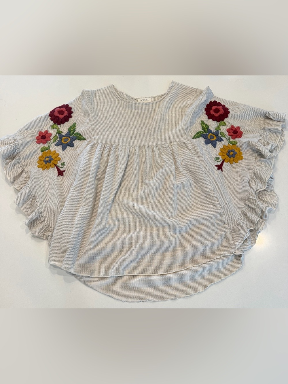 Roolee flutter sleeve embroidered striped blouse.
